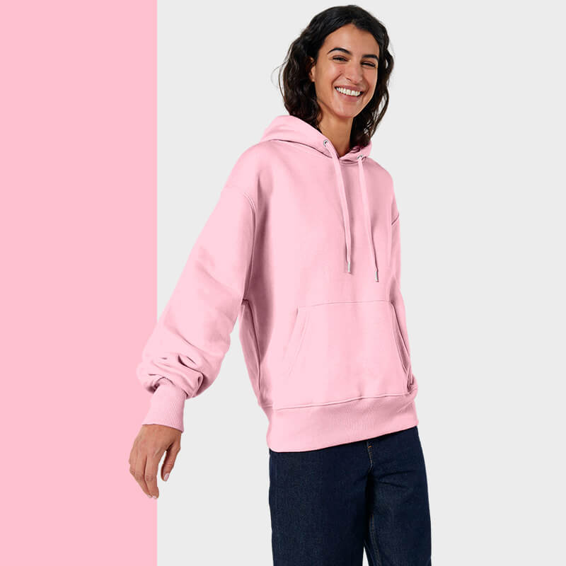 cotton pink cruiser hoodie modelled by a happy woman