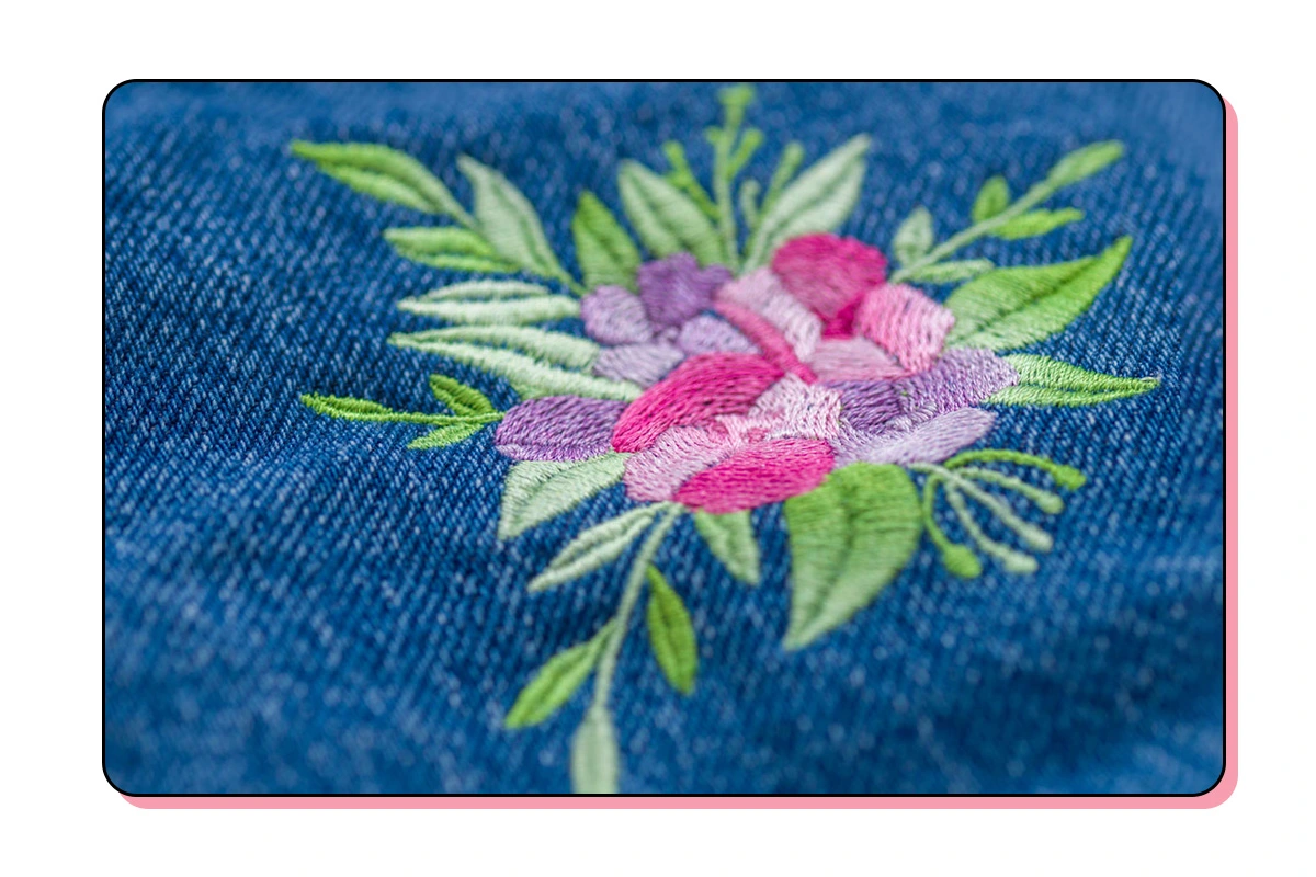 colourful azalea embroidery design on denim