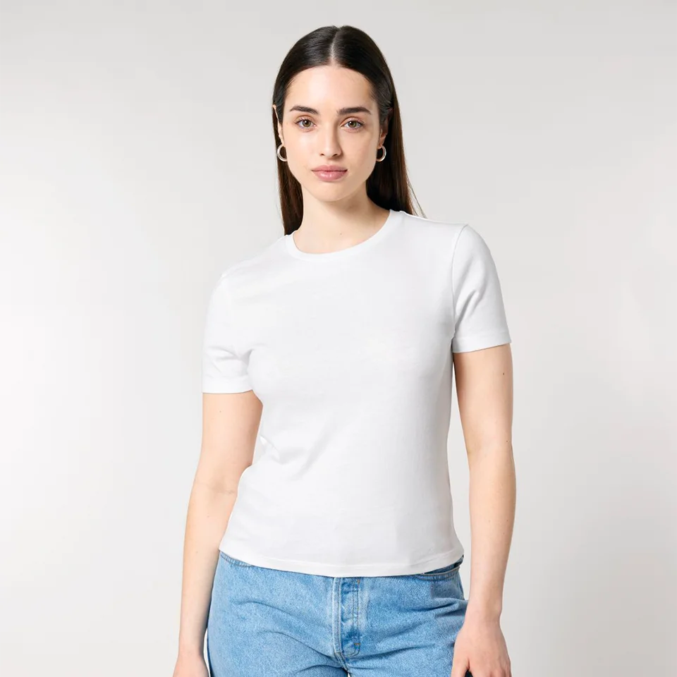 young female model wearing a white, fitted t-shirt